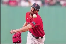  ?? ?? Red Sox starter Chris Sale delivers a pitch during the first inning of Thursday’s game against the Cincinnati Reds at Fenway Park.