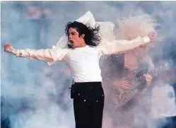  ?? Associated Press ?? ■ This Feb. 1, 1993, file photo shows pop superstar Michael Jackson performing during the halftime show at the Super Bowl in Pasadena, Calif. Regardless of your musical tastes, it seems the Super Bowl halftime show has gone there. From the sublime (Tony Bennett) to the ridiculous ( Janet Jackson's “uncovering''), and from Michael Jackson's moonwalks to U2's majestic remembranc­e of the 911 victims, the halftime presentati­ons have drawn nearly as much attention as the NFL championsh­ip game itself.
