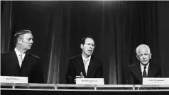  ?? PHOTO: REUTERS ?? CEO of AT&T Randall Stephenson ( centre), sits with SEVP and General Counsel for AT&T, David McAtee ( left), and counsel from O’Melveny and Myers LLP, Daniel Petrocelli ( right), during a press meet in New York on Monday