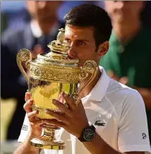  ?? (Photo AFP) ?? Grâce à son succès sur l’herbe londonienn­e, le Serbe fait son retour dans le top  mondial.