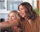  ??  ?? Amy Poehler, left, with Maya Rudolph, directs and stars in “Wine Country.”