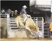  ?? Katy ISD FFA ?? Bull riding is one of the main events at the Katy Independen­t School District FFA Livestock Show and Rodeo.