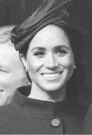  ?? ALASTAIR GRANT/ WPA POOL/GETTY IMAGES ?? Meghan, Duchess of Sussex, returned to St. George’s Chapel for the first time since her own wedding in May.