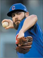  ?? THE ASSOCIATED PRESS FILE ?? Jake Arrieta is the Phillies’ newest pitcher, a move that came to fruition thanks in part to Arrieta’s friendship with Phillies’ newcomer Tommy Hunter.