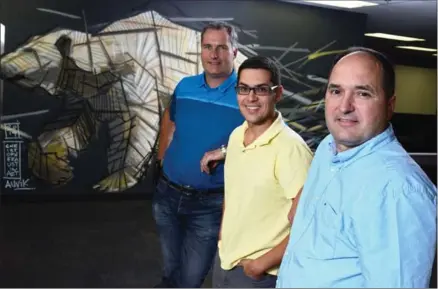  ?? WATERLOO RECORD FILE PHOTO ?? David Yach, left, Alex Hoff, centre, and Marc Morin founded Auvik Networks in 2011.