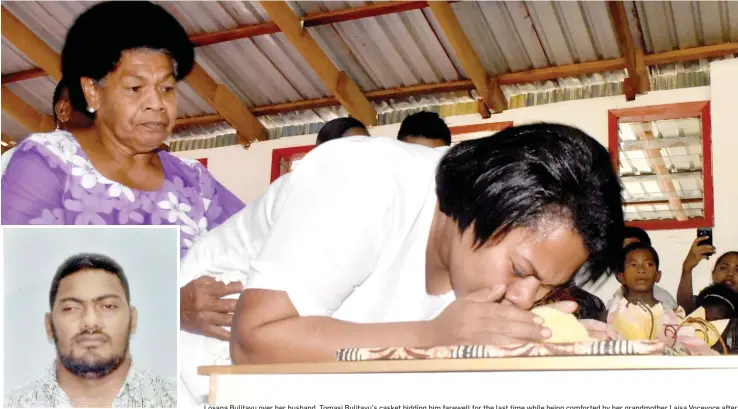  ?? Photo: Arieta Vakasukawa­qa ?? Losana Bulitavu over her husband, Tomasi Bulitavu’s casket bidding him farewell for the last time while being comforted by her grandmothe­r Laisa Vocevoce after the funeral church service at the Apostolic Life Ministry Church on August 9 2018. The late Tomasi Bulitavu