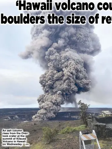  ??  ?? An ash column rises from the Overlook crater at the summit of Kilauea Volcano in Hawaii on Wednesday.