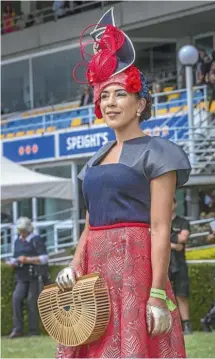  ?? JOHN KIRK-ANDERSON/STUFF ?? First time race-goer Emma Brown stood out in a headpiece she hand made.