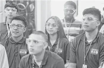  ?? Michael Ciaglo / Houston Chronicle ?? Students watch a biodiesel demonstrat­ion in their joint environmen­tal science and bio-tech engineerin­g classes at the Energy Institute High School, a STEM-focused magnet school in Houston ISD.