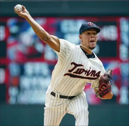  ?? BRUCE KLUCKHOHN- THE ASSOCIATED PRESS ?? Minnesota Twins starting pitcher Jose Berrios throws to the New York Yankees in the first inning of a baseball game on Wednesday, in Minneapoli­s.