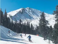  ?? John Meyer, The Denver Post ?? Skiers take advantage of Loveland Ski Area’s opening day on Oct. 20.