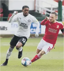  ??  ?? SWINDON
Reece Brown (left) in action for Posh at Swindon.