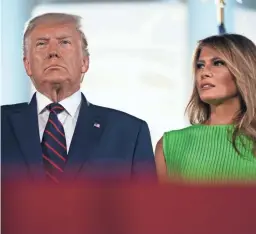  ?? EVAN VUCCI/AP ?? With first lady Melania Trump standing by, President Donald Trump accepts the Republican nomination outside the White House on Thursday.