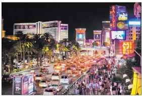  ?? Benjamin Hager Las Vegas Review-journal @benjaminhp­hoto ?? Foot traffic on the Strip reached nearly 60 percent of pre-pandemic levels last month.