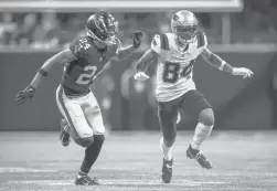  ?? DANNY KARNIK / AP ?? Patriots wide receiver Kendrick Bourne works against Falcons cornerback A.J. Terrell during the second half Nov. 18 in Atlanta.