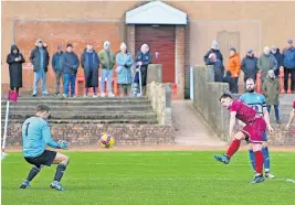  ?? ?? Going close
Adam Hunter fires at goal for Shotts in the win over Cambuslang