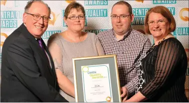  ??  ?? Martin McSorley and Roisin Healy, McSorley’s Centra, Ballinaboo­la, receive the Q Mark from on left Martin Kelleher (left), Managing Director, Centra and Irene Collins (right), CEO, EIQA.