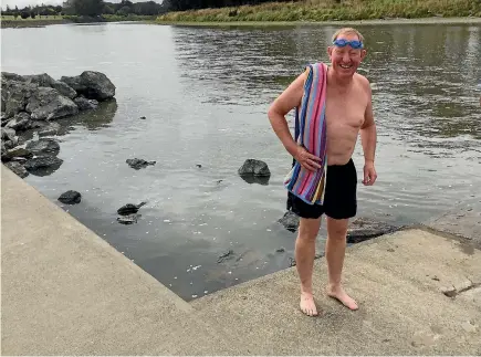  ?? PHOTO: FAIFAX NZ ?? Muddling the waters . . . Environmen­t Minister Nick Smith before a 2016 dip in the Manawatu River, which has been described as the lower North Island’s ‘‘river of shame’’. He is attracting fresh criticism over the Government’s low expectatio­ns for the...