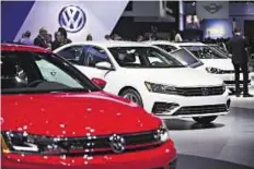  ?? Bloomberg ?? Bumpy road ahead Volkswagen AG 2016 vehicles during the Los Angeles Auto Show in Los Angeles last month.