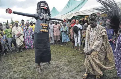  ??  ?? Blessings: The Igbo-ora festival celebrates the town’s reputation for having the highest number of twins in the world. Phot: Pius Utomi Ekpei/afp