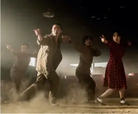  ??  ?? In sync Tomasz Kot and Joanna Kulig in Cold War (left); the tap dancers of Swing Kids (above)