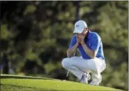  ?? ASSOCIATED PRESS FILE ?? Jordan Spieth pauses on the 18th green before putting out during the final round of the Masters tournament in Augusta, Ga., in 2016. Spieth returns to the Masters after having blown a five‑shot lead on the back nine last year.