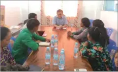  ?? FACEBOOK ?? Opposition lawmaker Son Chhay (centre) speaks to villagers affected by the Lower Sesan II dam yesterday at CNRP headquarte­rs.