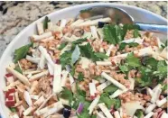  ??  ?? One of Shawn Zell’s missions has been to introduce the Bucks to healthy grains like farro, mixed here with celery root, apple, parsley and cheese. NANCY STOHS