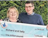  ??  ?? JACKPOT Sally and Richard with cheque in 2015