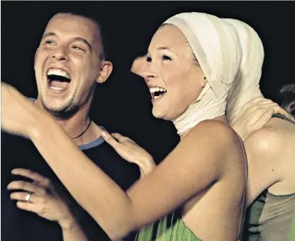  ??  ?? Rags to riches: the story of Alexander Mcqueen, left, laughing alongside Kate Moss, is a fascinatin­g one