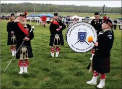  ?? Doug Walker / RN-T ?? Atholl Highlander­s Pipes and Drums bagpipers from Stone Mountain help to start the first Georgia Steeplecha­se at Kingston Downs on Saturday.