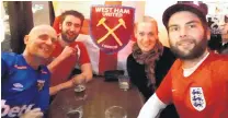  ?? PHOTO: SUPPLIED ?? Fun time . . . Waiting for England’s quarterfin­al against Sweden to start are (from left): Richard Eve, Bradley Eve, Suz Eve and Spencer Eve, at the Pig and Whistle Pub in Queenstown.