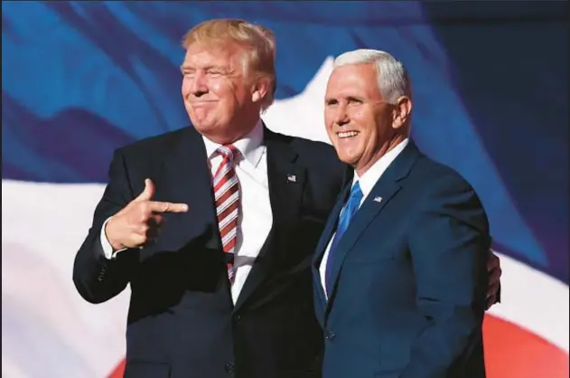  ?? GETTY IMAGES ?? They were a team in 2016 as they worked to capture the White House. Now not-buddies-anymore Donald Trump (left) and Mike Pence (right) are both struggling to avoid the fallout from Trump’s attempt to overturn the results of the 2020 election. Trump has declared a 2024 bid for the presidency, and Pence is considerin­g one.