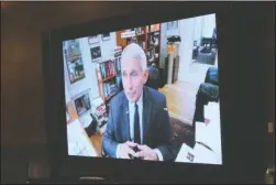  ?? The Associated Press ?? SPEAKING: Dr. Anthony Fauci, director of the National Institute of Allergy and Infectious Diseases, speaks remotely during a virtual Senate Committee for Health, Education, Labor, and Pensions hearing, Tuesday, on Capitol Hill in Washington.