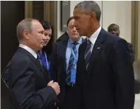  ??  ?? RUSSIAN PRESIDENT Vladimir Putin meets with US President Barack Obama on the sidelines of the G20 Summit in Hangzhou, China, in September.