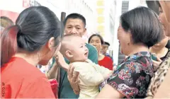  ??  ?? China’s move to ease its one-child policy pushed up births in 2016, but the figure dropped last year.