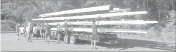  ?? ANN DAVIDSON ?? The trailer loaded with rowing skulls last Thursday that was destined for Douglass Beach in Knowlton for the Quebec rowing team could have been mistaken for sleek missiles.