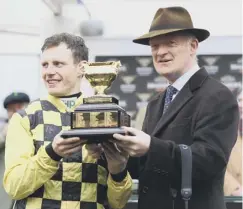  ??  ?? Willie Mullins with jockey Paul Townend and the Gold Cup