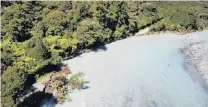  ?? PHOTO: NZTA ?? Gone . . . The section of the Lower Hollyford Rd washed out during the February floods.