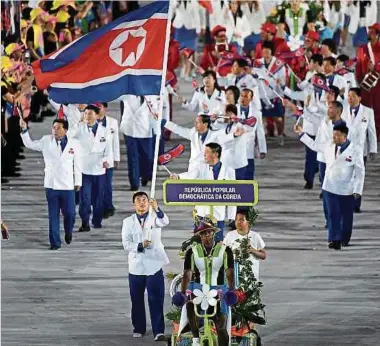  ?? Foto: AFP ?? Die nordkorean­ische Landesflag­ge wird bei Olympia 2021 nicht wehen.