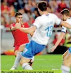  ??  ?? Portugal’s Andre Silva scores their first goal. R EUTERS