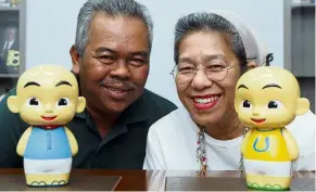  ?? — AZLINA ABDULLAH/THE STAR ?? Burhanuddi­n and ainon are the husband-and-wife team headingLes’ copaque, the company behind animated twin brothers upin and Ipin.