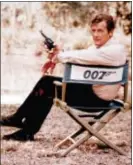  ?? THE ASSOCIATED PRESS ?? British actor Roger Moore, playing the title role of secret service agent 007, James Bond, is shown on location in England in 1972.
