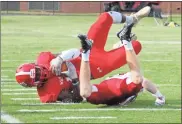  ?? Scott Herpst ?? LFO receiver Jamillion Womble comes down with a tough leaping catch during the opening drive of the Warriors’ scrimmage at Chattooga last Tuesday. Womble hauled in a long touchdown pass moments later to give the Red-and-White an early 7-0 lead.