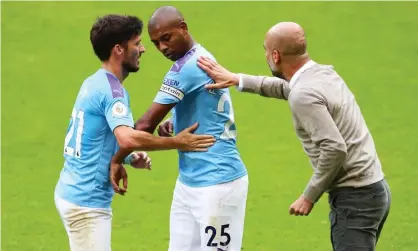  ?? Photograph: Matt McNulty/Manchester City FC via Getty Images ?? David Silva (left) will leave Manchester City at the end of the season while the future of Fernandinh­o (centre) has yet to be decided.