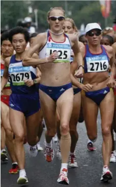  ?? NIR ELIAS/REUTERS FILE PHOTO ?? British runner Paula Radcliffe, centre, competes at the 2008 Olympics in Beijing. Her 2:15:25 world record is considered by some to be at least equivalent to a men’s sub-two-hour marathon.