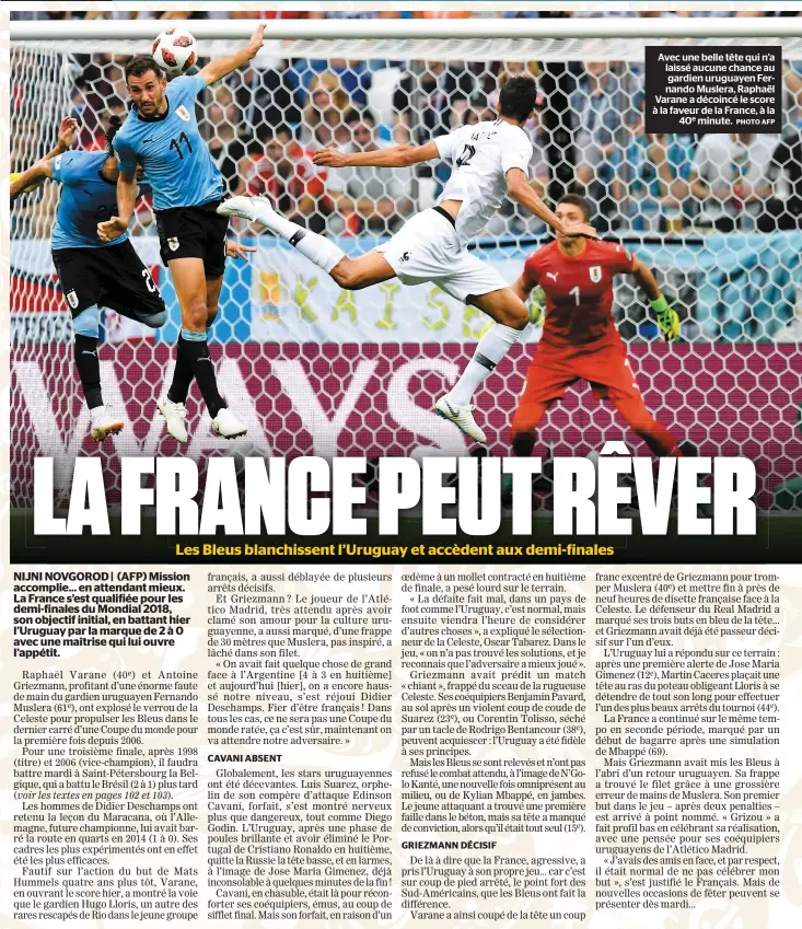  ?? PHOTO AFP ?? Avec une belle tête qui n’a laissé aucune chance au gardien uruguayen Fernando Muslera, Raphaël Varane a décoincé le score à la faveur de la France, à la 40e minute.