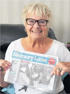  ??  ?? Prized possession Betty Flanagan with the Memory Lane page featuring her parents
