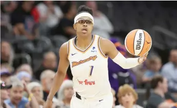  ?? GETTY IMAGES PHOTOS ?? Dana Evans (top) has the inside track to be the Sky’s starting point guard. Diamond DeShields (bottom, shown with the Mercury) is back after helping the Sky win the WNBA title in 2021.