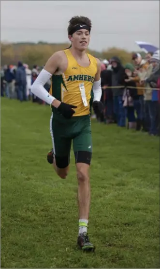  ?? JEN FORBUS — THE MORNING JOURNAL ?? Josh Hill of Amherst Steele easily finished first in the SWC cross country championsh­ip race.